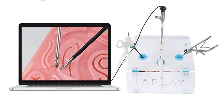 Medi-Lap Mini portable laparoscopic trainer connected to a laptop by USB camera